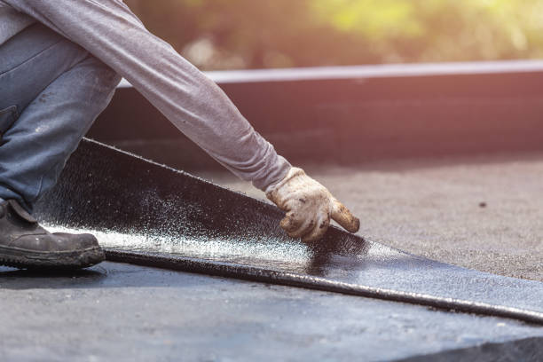 Professional Basement Waterproofing technician working in Bumpass, VA